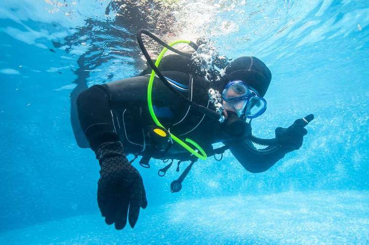 diver with scuba gauge computer