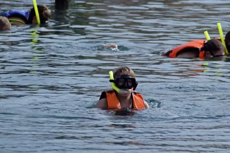 child snorkeling