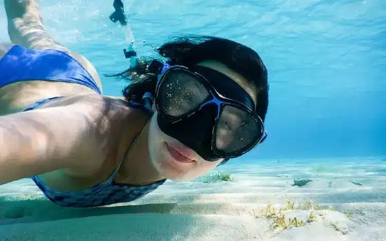snorkeling in traditional mask
